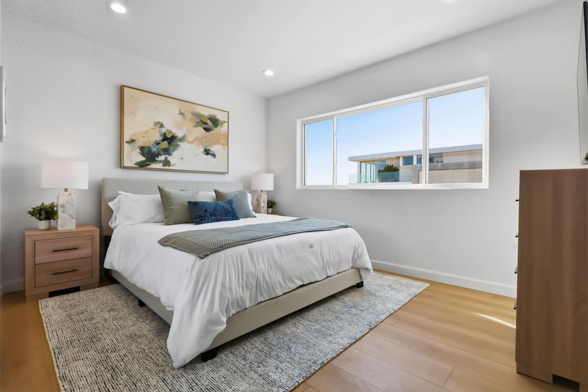 Guest Suite No. 2, with layered linens and warm natural textures