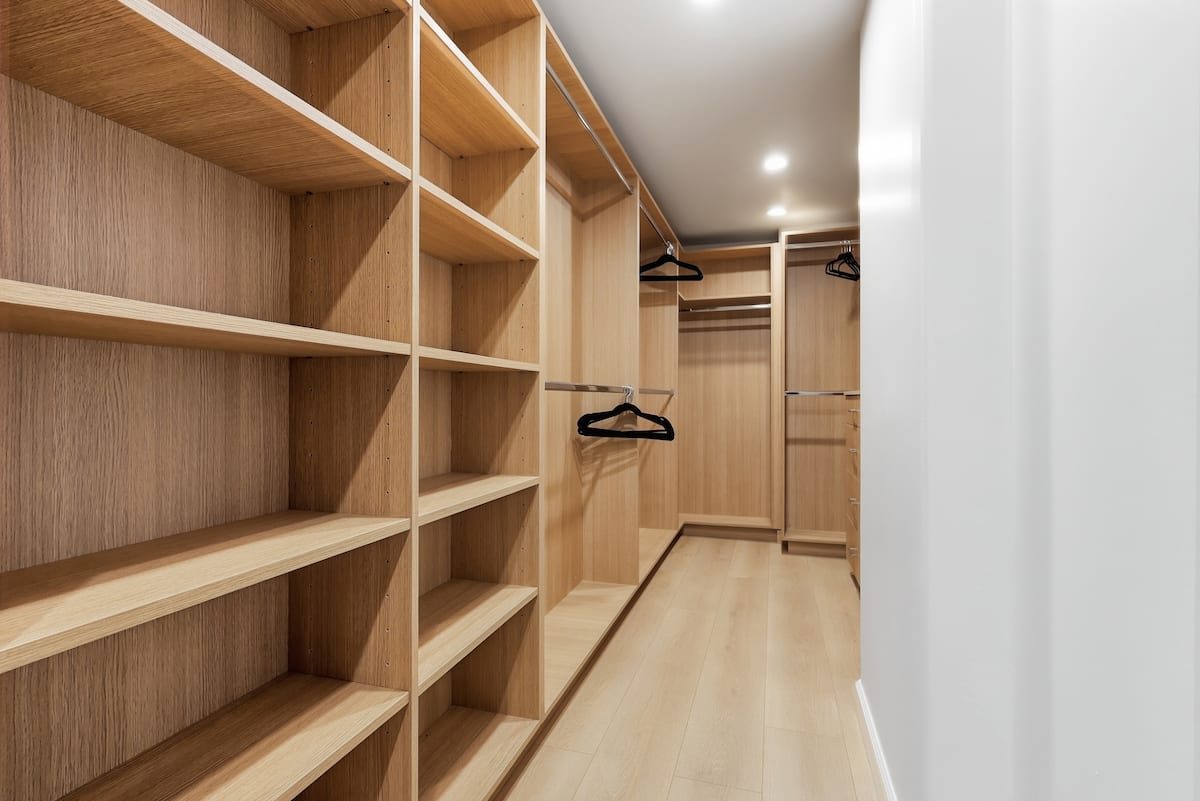 Generous walk-in wardrobe with custom storage