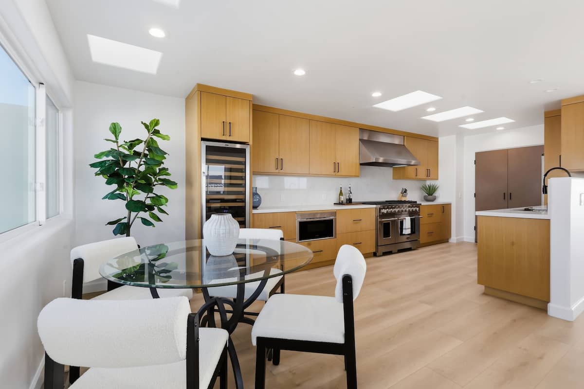Bright chef's kitchen with custom oak cabinetry