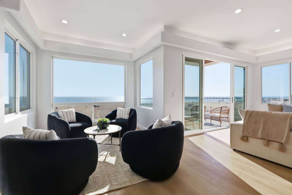 Open living and kitchen spaces with whitewater views